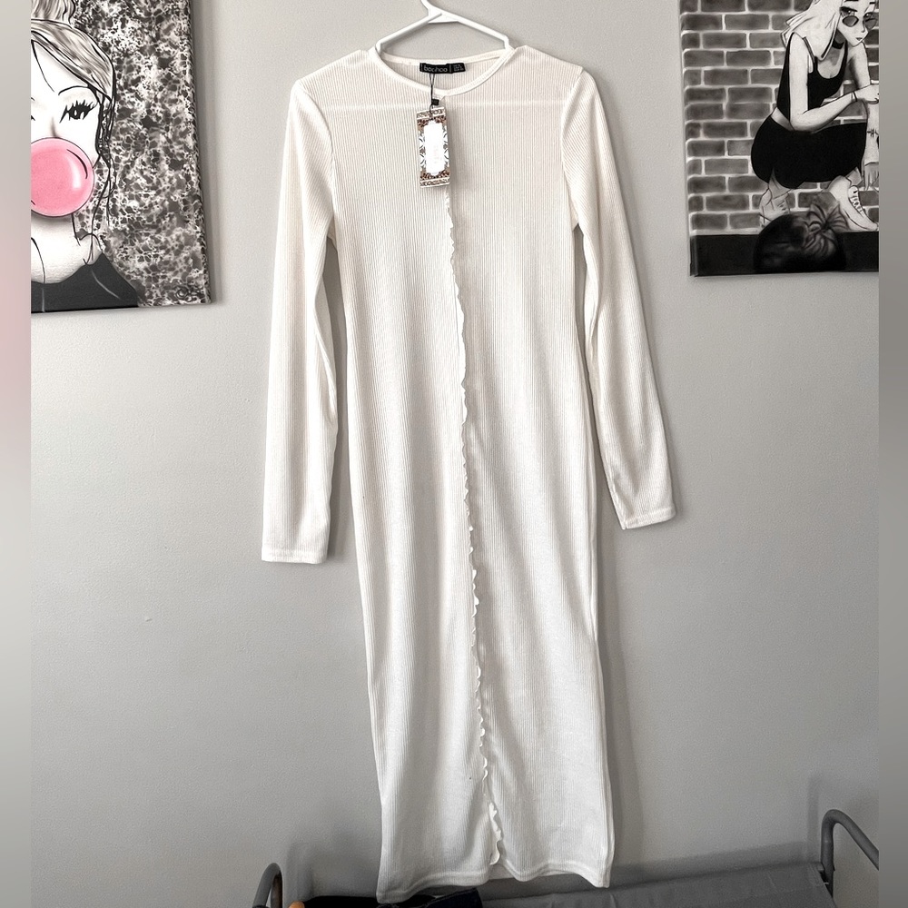 White tall exposed seam ribbed midi dress.
